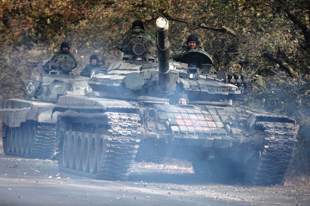 Rebels pull heavy weaponry back Wednesday in Donetsk, Ukraine. PHOTO: TASS/ZUMA PRESS